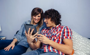 Couple looking at Tablet